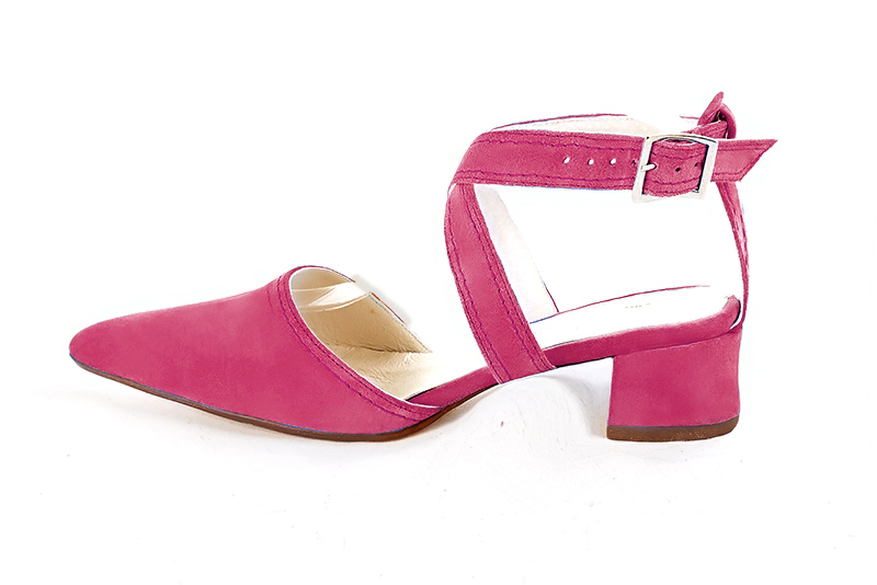 Fuschia pink women's open back shoes, with crossed straps. Tapered toe. Low flare heels. Profile view - Florence KOOIJMAN